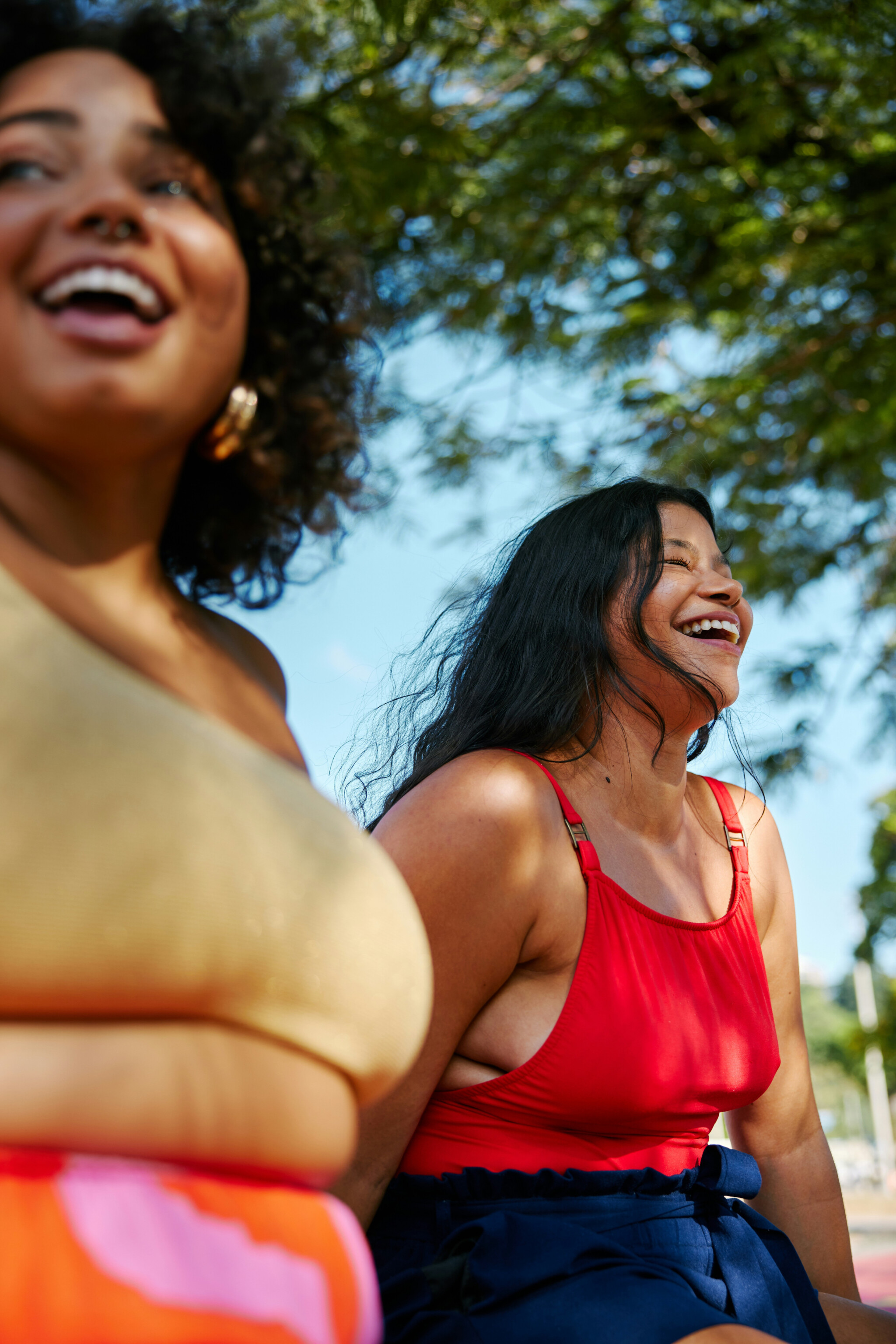 Group Of Humans, Healthspan Image, Two middle aged women smiling on a sunny day under a tree